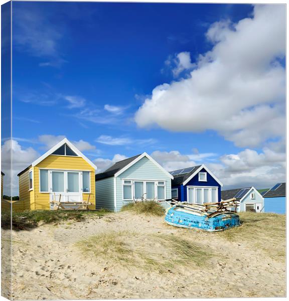 Beach huts on a summer afternoon  Canvas Print by Shaun Jacobs