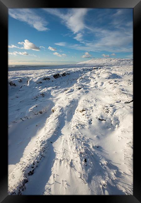 Snow on the moors Framed Print by Andrew Kearton