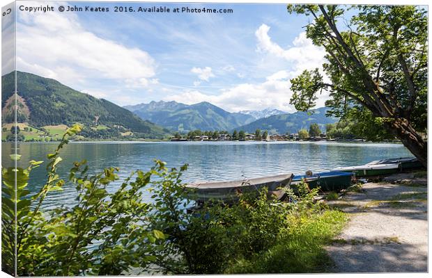 The lake at Zell am See Austria Canvas Print by John Keates