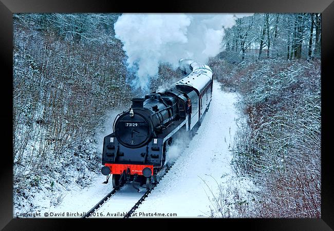 Steam locomotive 73129 In Snow Framed Print by David Birchall