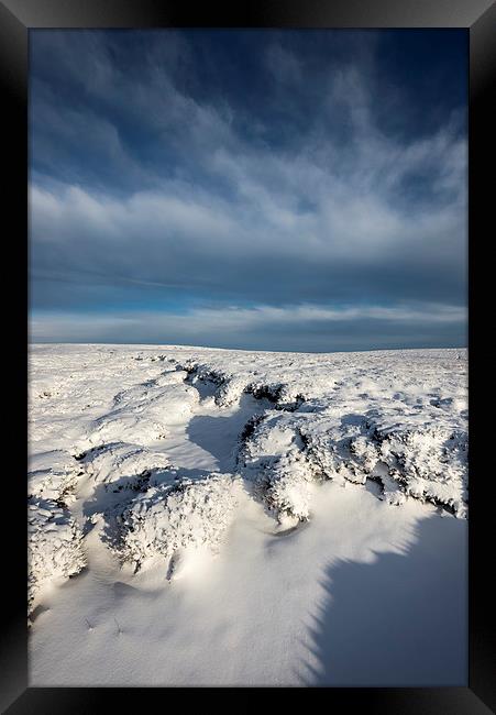 Snow on the moors Framed Print by Andrew Kearton