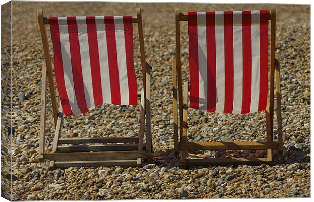 Red Deckchairs Canvas Print by jim jennings