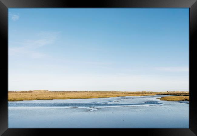 Low tide salt marsh at Burnham Overy Staithe, Norf Framed Print by Liam Grant