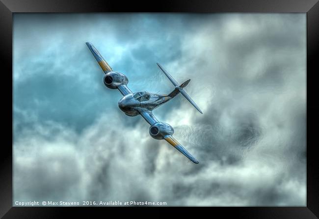 Gloster Meteor comes out of the clouds Framed Print by Max Stevens
