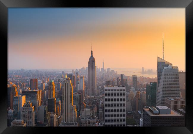 Empire State dusk view NYC Framed Print by Greg Marshall