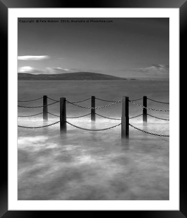 Waves and safety fence on the causeway Framed Mounted Print by Pete Watson