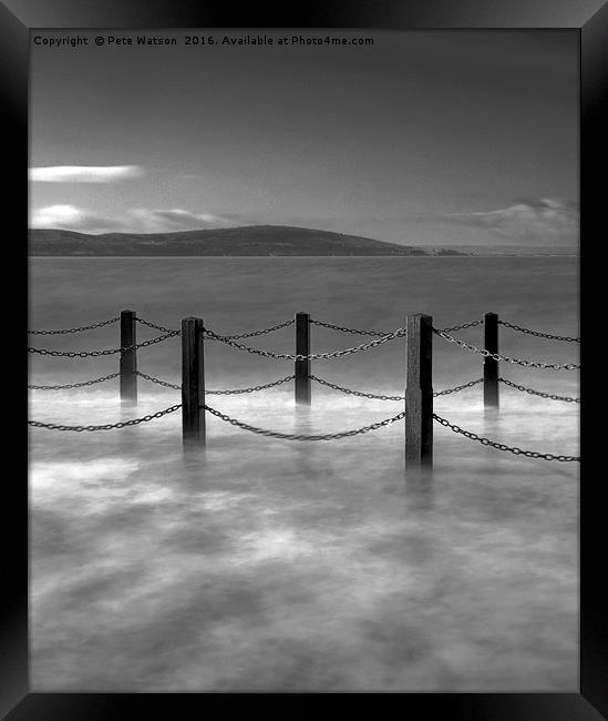 Waves and safety fence on the causeway Framed Print by Pete Watson