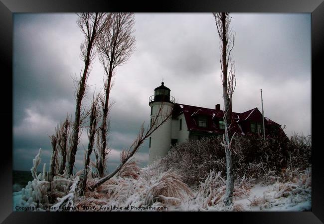 Winter Lighthouse Framed Print by Ian Pettman
