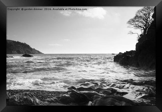 A black and white image of Castle Cove near Dartmo Framed Print by Gordon Dimmer