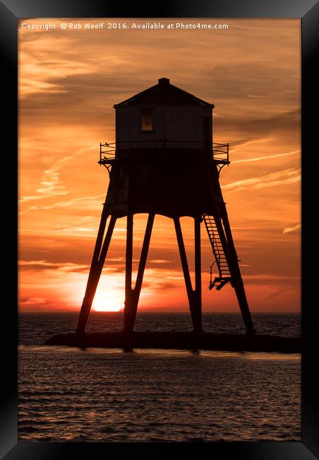 Dovercourt Leading Light in Silhouette. Framed Print by Rob Woolf