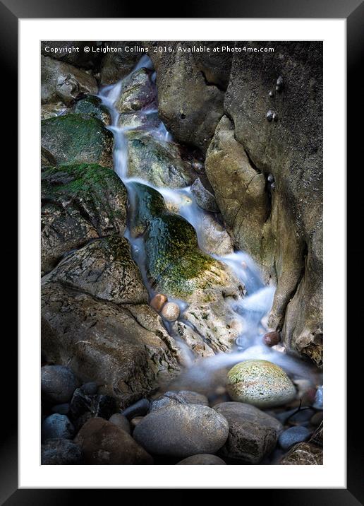 Water and rocks Framed Mounted Print by Leighton Collins
