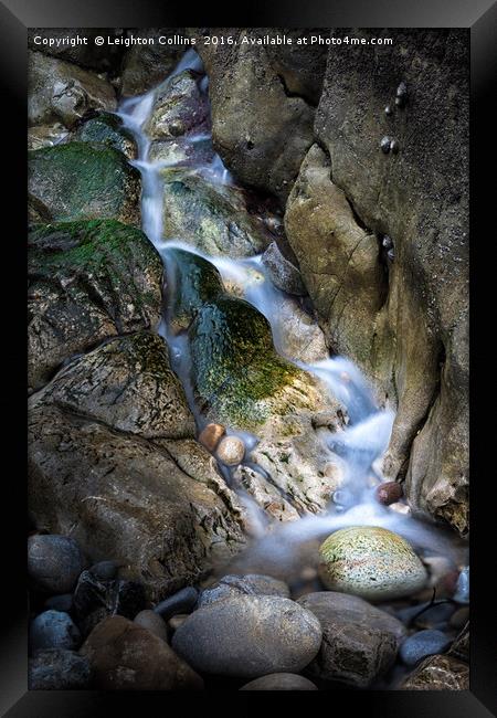 Water and rocks Framed Print by Leighton Collins