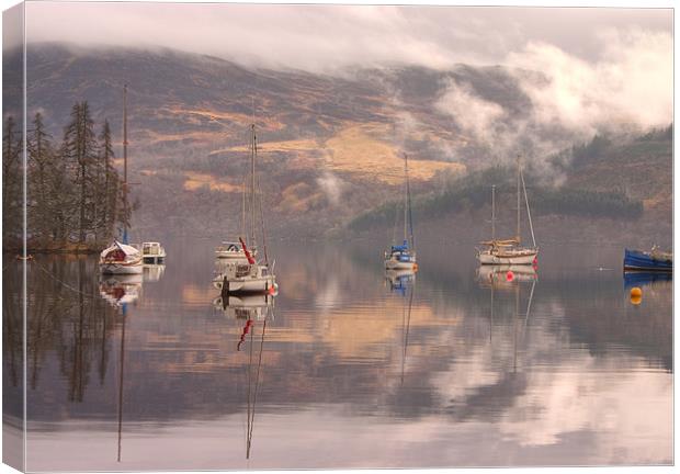 Morning reflections of Loch Ness Canvas Print by Ian Middleton