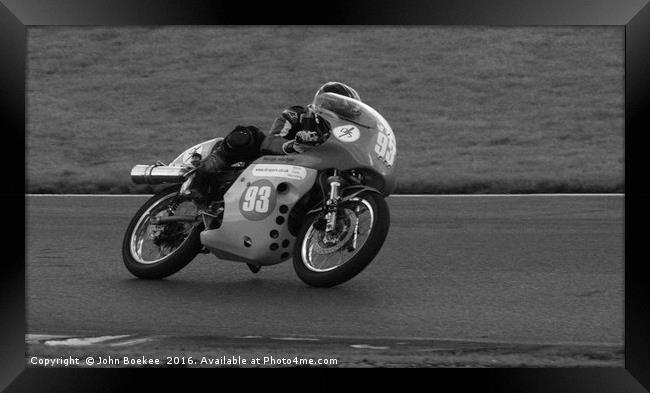 Racing bikes at Snetterton racetrack  Framed Print by John Boekee