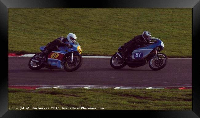 Racing bikes at Snetterton racetrack  Framed Print by John Boekee