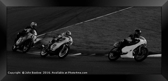 Racing bikes at Snetterton racetrack  Framed Print by John Boekee