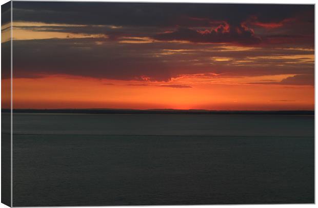 Red dusk Canvas Print by Ian Middleton