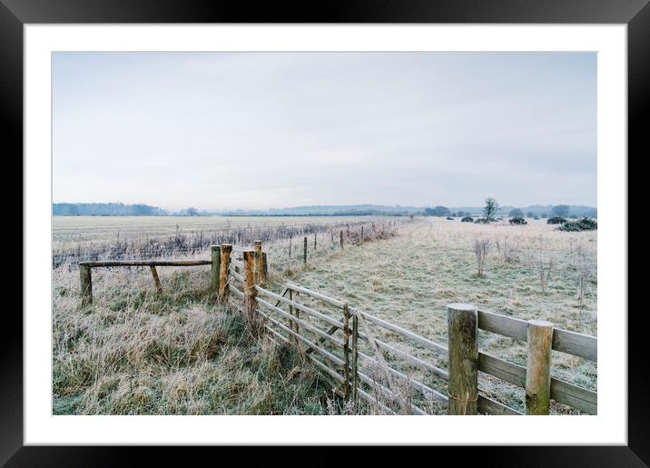 Rural field and gate covered in frost. Norfolk, UK Framed Mounted Print by Liam Grant