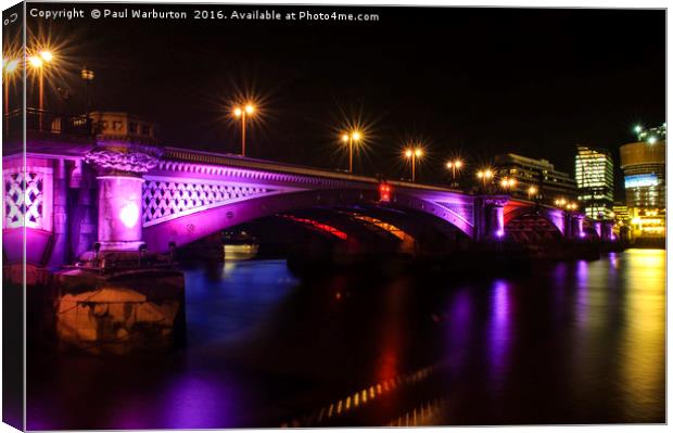 Blackfriars Bridge Illuminated in Purple Canvas Print by Paul Warburton