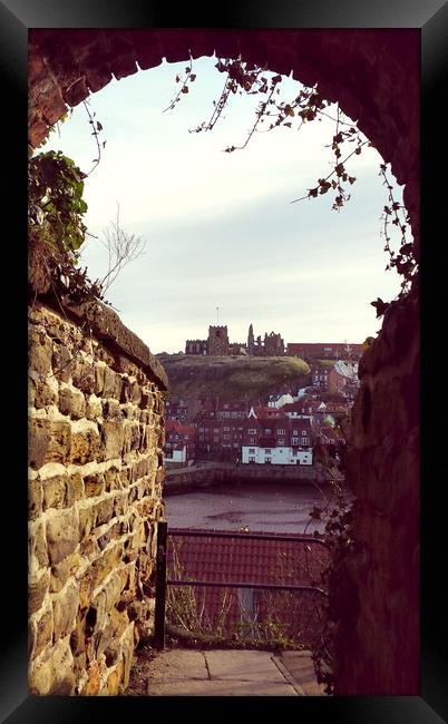 Keyhole View Whitby Framed Print by Dave Leason