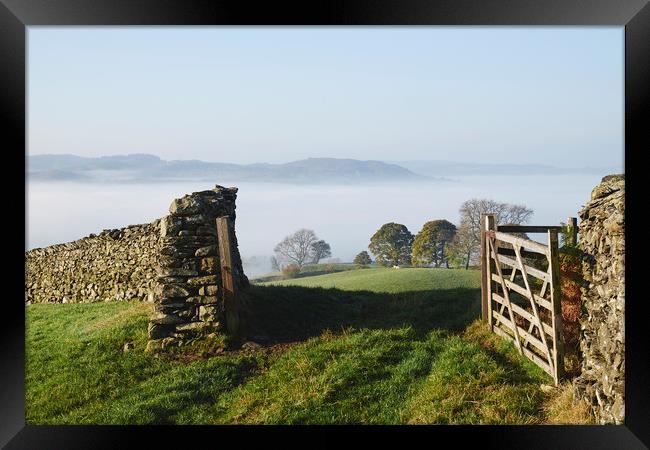 Fog in the valley at sunrise. Troutbeck, Cumbria,  Framed Print by Liam Grant