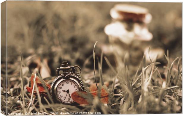 Vintage clock in the grass Canvas Print by Pavel Ivanov