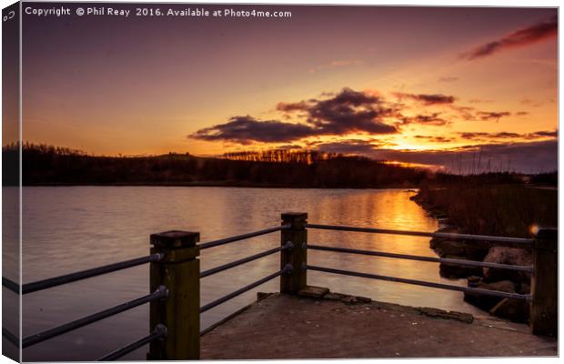 Sunset over the lake Canvas Print by Phil Reay