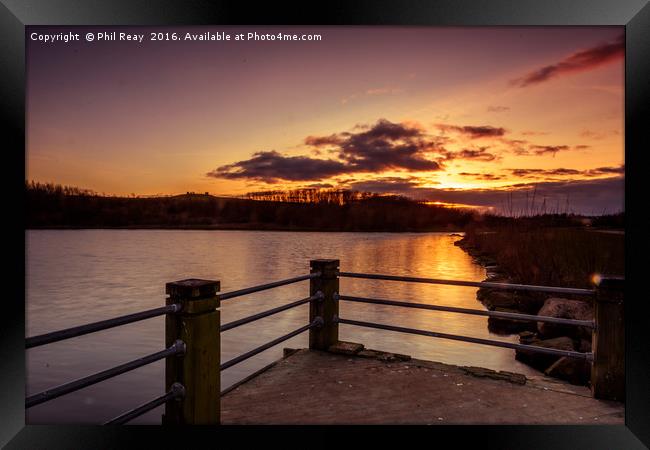 Sunset over the lake Framed Print by Phil Reay