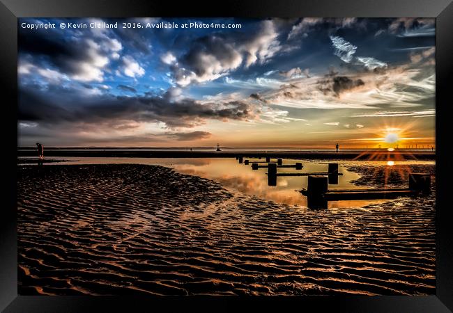 Sun setting at Crosby Beach Framed Print by Kevin Clelland