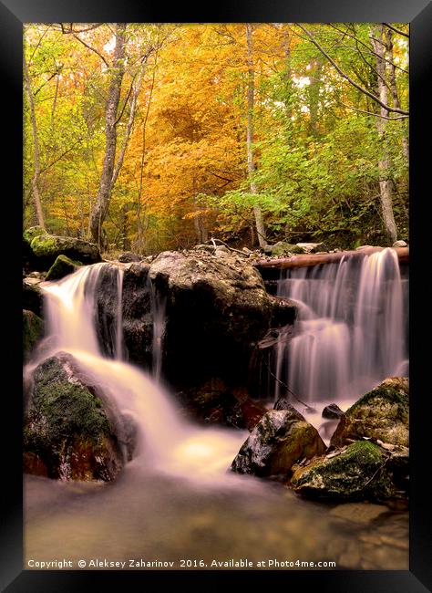 Waterfall in the forest during Autumn Framed Print by Aleksey Zaharinov