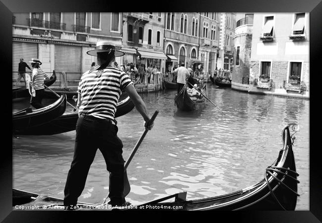 A gondola boatman in Venice Framed Print by Aleksey Zaharinov
