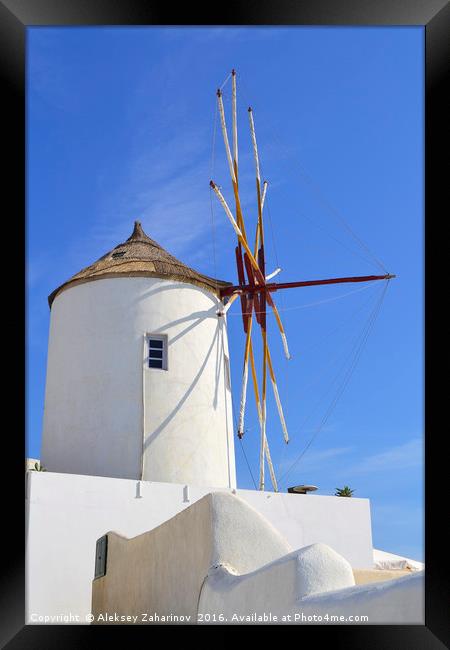 A windmill in Santorini island, Greece Framed Print by Aleksey Zaharinov