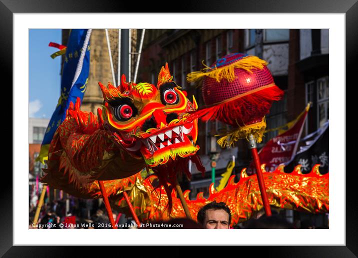 Orange Chinese Dragon bending its long body Framed Mounted Print by Jason Wells