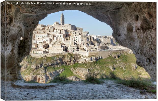 Matera viewed from one of the caves in the Murgia  Canvas Print by Julie Woodhouse