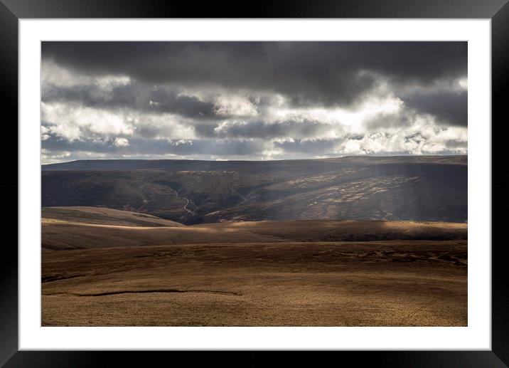 Sunbeams over the moors Framed Mounted Print by Andrew Kearton