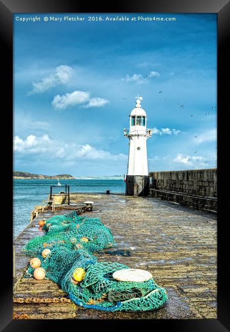 Nets and Lighthouse Framed Print by Mary Fletcher