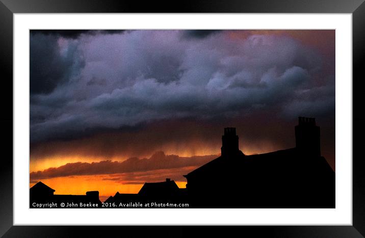 Storm over Norwich with sunset Framed Mounted Print by John Boekee