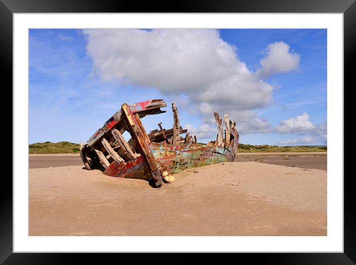 Fishing boat wrecked on the sand Framed Mounted Print by Shaun Jacobs
