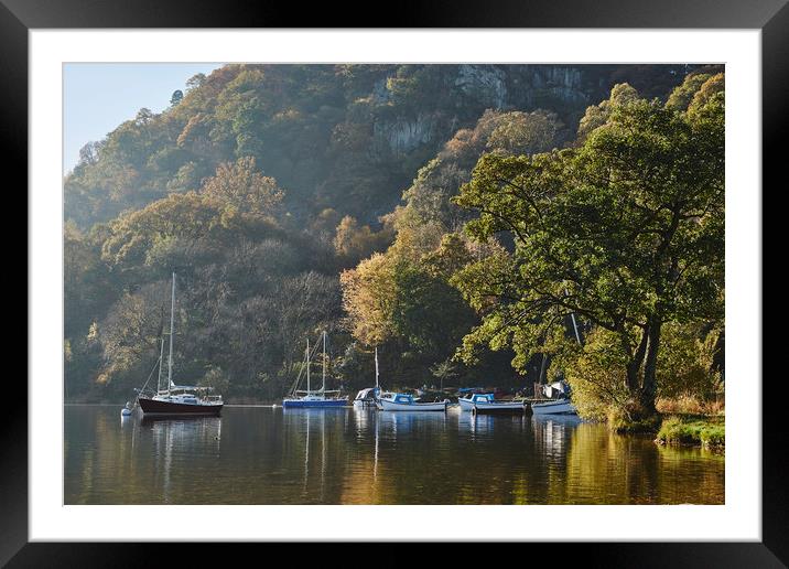 Boats and autumnal colour. Ullswater, Cumbria, UK. Framed Mounted Print by Liam Grant