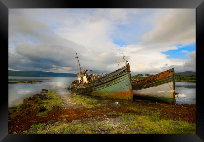 Fishing boats  abandoned Isle of Mull Framed Print by Eddie John