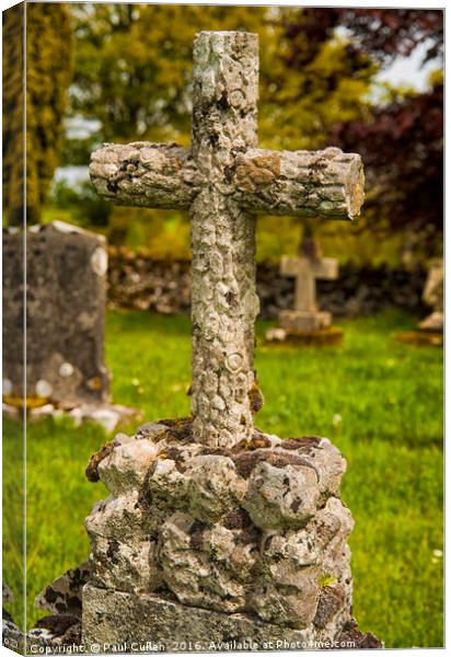 Cross monument in Lowther Church Yard. Canvas Print by Paul Cullen