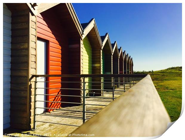 Holiday huts at Blyth beach Print by Marc Bates