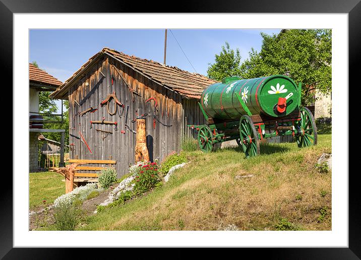 Old farm machinery in Nova Vas, Slovenia Framed Mounted Print by Ian Middleton
