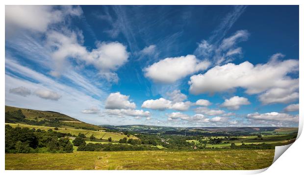 Fluffy clouds over Glossop Print by Andrew Kearton