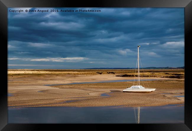 Stranded at low tide Framed Print by Dave Angood