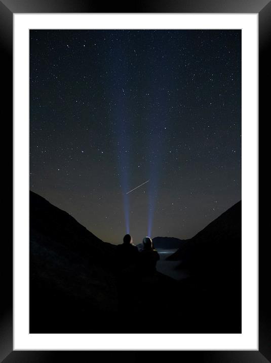 Young couple watching shooting stars in the mounta Framed Mounted Print by Liam Grant