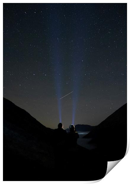Young couple watching shooting stars in the mounta Print by Liam Grant