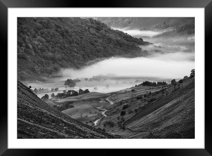 Fog formed in the valley at sunrise. Kirkstone Pas Framed Mounted Print by Liam Grant