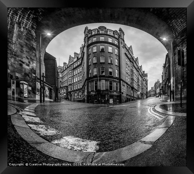 Newcastle street scene in monochrome Framed Print by Creative Photography Wales
