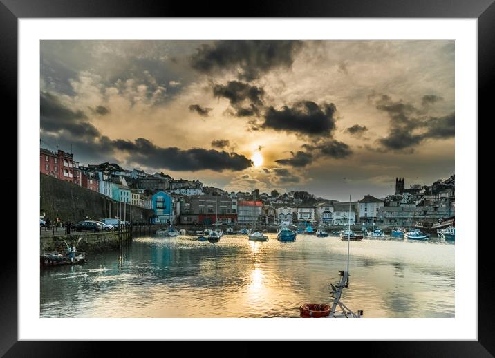 Brixham Harbour with a Setting Sun Framed Mounted Print by Gordon Dimmer